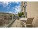 Balcony includes a table and chair set with great views of the surrounding neighborhood and sky at 601 W Rosemary St # 418, Chapel Hill, NC 27516