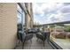 Cozy balcony with outdoor furniture and a beautiful view of the city skyline at 601 W Rosemary St # 418, Chapel Hill, NC 27516