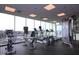 Bright and airy gym space with various cardio machines and scenic city views at 601 W Rosemary St # 418, Chapel Hill, NC 27516