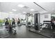 Fully equipped gym with state-of-the-art equipment and floor-to-ceiling windows at 601 W Rosemary St # 418, Chapel Hill, NC 27516