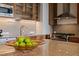 Spacious kitchen island with granite countertops, ideal for food preparation and casual dining at 601 W Rosemary St # 418, Chapel Hill, NC 27516