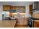 Updated kitchen featuring stainless steel appliances, granite countertops, and stylish cabinetry at 601 W Rosemary St # 418, Chapel Hill, NC 27516