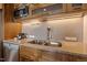 Modern kitchen with stainless steel appliances, granite counters, and ample cabinet space at 601 W Rosemary St # 418, Chapel Hill, NC 27516