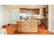 Modern kitchen with stainless steel appliances, granite countertops, and custom cabinetry at 601 W Rosemary St # 418, Chapel Hill, NC 27516