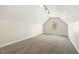 Bonus room featuring neutral walls, carpeted floors, and a large window at 605 Lakeview Ave, Wake Forest, NC 27587