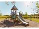 Community playground featuring a slide and tower, great for to enjoy at 609 Callan View Ave, Wake Forest, NC 27587