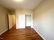 Bedroom with hardwood floors and closet at 6705 Somerknoll Dr, Durham, NC 27713