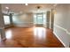 Open living room featuring hardwood floors and recessed lighting at 6705 Somerknoll Dr, Durham, NC 27713