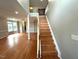 View of the staircase with hardwood floors at 6705 Somerknoll Dr, Durham, NC 27713