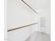 Spacious walk-in closet with shelves and rods for ample storage at 7117 Sandringham Dr, Raleigh, NC 27613