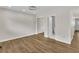 A spacious bedroom with wood floors, recessed lighting, and closet space at 717 E Millbrook Rd, Raleigh, NC 27609