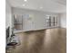 Spacious living room with hardwood floors, and plenty of natural light at 717 E Millbrook Rd, Raleigh, NC 27609