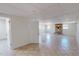 Spacious basement area with fireplace, windows, and an accessible door at 72 Edgemont Ave, Roxboro, NC 27573
