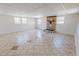 Finished basement with tile floors and a decorative fireplace feature at 72 Edgemont Ave, Roxboro, NC 27573
