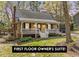 Charming home featuring a cozy porch, landscaped yard, and a classic brick chimney at 7317 Mill Ridge Rd, Raleigh, NC 27613