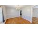Elegant dining room featuring hardwood floors and a stylish chandelier at 772 Old Allensville, Roxboro, NC 27574