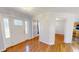 Inviting foyer with hardwood floors, a decorative glass front door, and access to multiple rooms at 772 Old Allensville, Roxboro, NC 27574