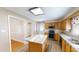 Spacious kitchen boasts a center island, stainless steel appliances, and wood cabinets at 772 Old Allensville, Roxboro, NC 27574