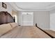 Large bedroom showcasing a neutral color palette and decorative bed at 801 Noconia Pl, Fuquay Varina, NC 27526