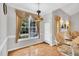 Cozy dining area with ample natural light and hardwood floors at 801 Noconia Pl, Fuquay Varina, NC 27526