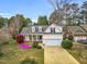 Charming home with a welcoming front porch, dormer windows, and well-manicured landscaping at 801 Noconia Pl, Fuquay Varina, NC 27526