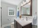 Bathroom featuring a vanity, a neutral color palette and natural light at 806 S First St, Smithfield, NC 27577