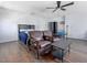 Comfortable bedroom with wood floors, ceiling fan and cozy seating at 806 S First St, Smithfield, NC 27577