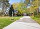 Charming brick home with well-maintained landscaping and a long driveway at 806 S First St, Smithfield, NC 27577