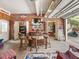 Finished garage with a brick accent wall and full bar area at 806 S First St, Smithfield, NC 27577
