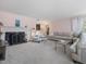 Cozy living room with fireplace, neutral carpet, and comfortable seating area at 806 S First St, Smithfield, NC 27577