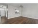 This open living space boasts hardwood floors and neutral paint, perfect for entertaining at 8700 Leeds Forest Ln, Raleigh, NC 27615