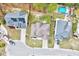 An aerial view of multiple homes in a suburban neighborhood, showcasing their layouts, driveways, and landscaping at 8932 Buffalo Gourd Ln, Angier, NC 27501