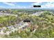 Aerial view shows the location of 8932 Buffalo Gourd Ln within the surrounding wooded community, close to Angier at 8932 Buffalo Gourd Ln, Angier, NC 27501