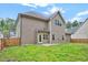 The backyard has a great space with fenced-in yard and a patio at 8932 Buffalo Gourd Ln, Angier, NC 27501