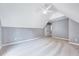 Secondary bedroom with a vaulted ceiling, neutral paint, ceiling fan, plush carpeting, and a closet at 8932 Buffalo Gourd Ln, Angier, NC 27501