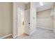 Walk-in closet with carpet and wire shelving at 8932 Buffalo Gourd Ln, Angier, NC 27501