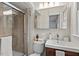 Updated bathroom with a sleek vanity, glass-enclosed shower, and modern fixtures at 927 Ferncrest Dr, Durham, NC 27705