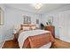 Cozy bedroom featuring warm tones, natural light, and hardwood floors for a welcoming retreat at 927 Ferncrest Dr, Durham, NC 27705