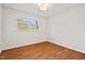 Bright bedroom featuring hardwood floors and lots of natural light at 927 Ferncrest Dr, Durham, NC 27705