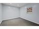 Neutral bedroom featuring carpet and a window at 927 Ferncrest Dr, Durham, NC 27705