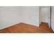 This bedroom featuring hardwood floors and a closet at 927 Ferncrest Dr, Durham, NC 27705