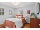Comfortable bedroom with neutral colors and natural light creates a peaceful atmosphere at 927 Ferncrest Dr, Durham, NC 27705