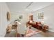 Cozy living room with large windows providing natural light at 927 Ferncrest Dr, Durham, NC 27705