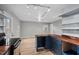 Spacious living room featuring an open floor plan, track lighting, vinyl flooring and large windows at 927 Ferncrest Dr, Durham, NC 27705