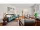 Cozy living room design featuring natural light, modern furnishings and hardwood floors at 927 Ferncrest Dr, Durham, NC 27705
