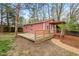 Charming outbuilding with a deck and gravel pathway to the entrance at 927 Ferncrest Dr, Durham, NC 27705