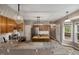Well-equipped kitchen features an island, granite counters, stainless appliances, and wooden cabinetry at 102 Swallow Hill Ct, Cary, NC 27513