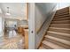 Inviting living space with hardwood floors and stairway access at 102 Swallow Hill Ct, Cary, NC 27513