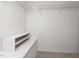 Spacious walk-in closet with shelving and plenty of storage space at 102 Swallow Hill Ct, Cary, NC 27513