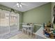 Cozy breakfast nook featuring a white table set and sliding glass doors to a private patio at 103 Friar Ln, Carrboro, NC 27510